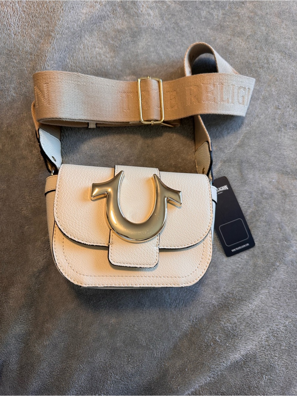 True Religion Cream Crossbody with Gold Emblem and Wide Branded Strap
